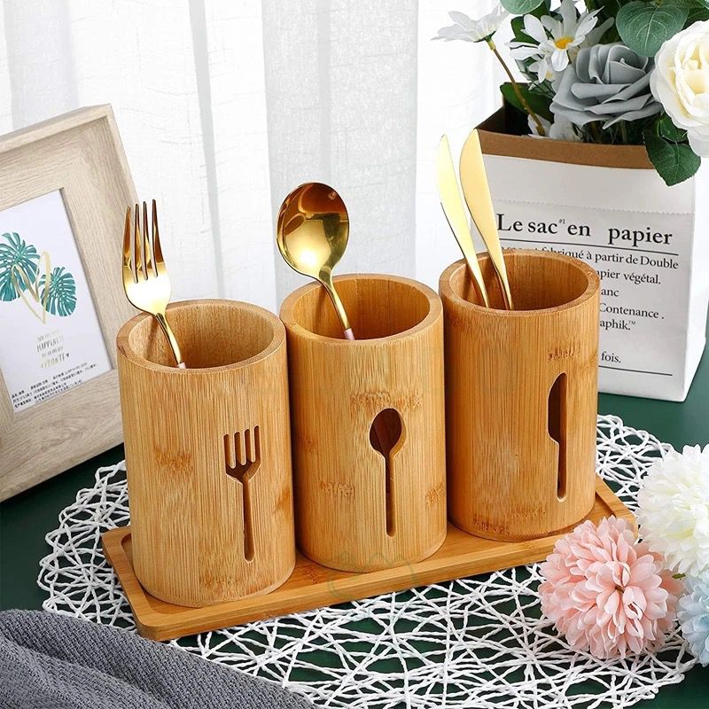 Eco-friendly 4in 1 bamboo cutlery holder inclusive of a bamboo base