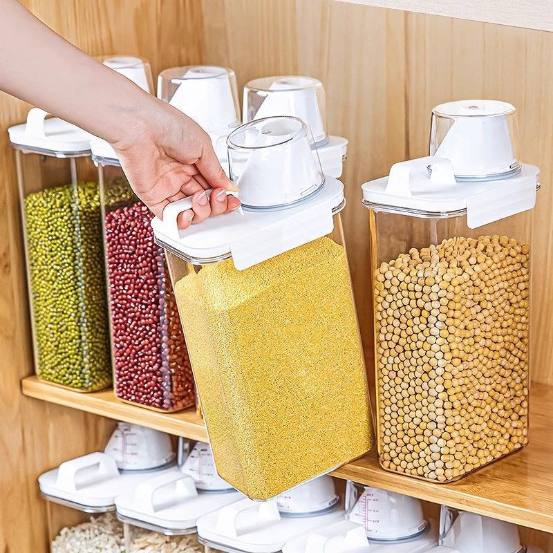 Storage containers with measuring cup