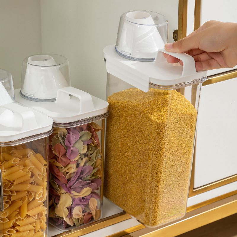 Storage containers with measuring cup