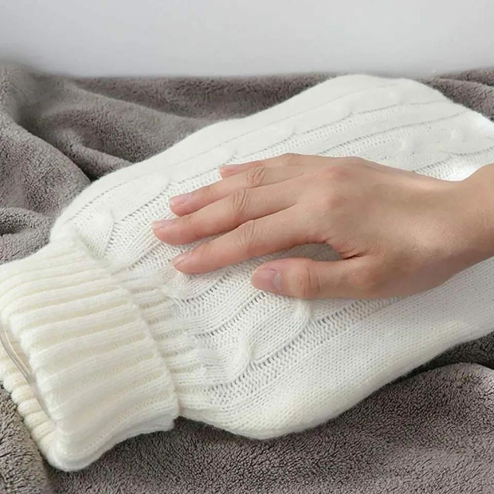 Hot water bottle knitted cover